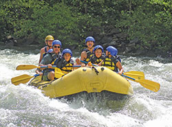 Members of Fraternus from St. Paul the Apostle Parish in Greencastle enjoy whitewater rafting during a ranch experience last spring in Tennessee. (Photo courtesy Father John Hollowell)